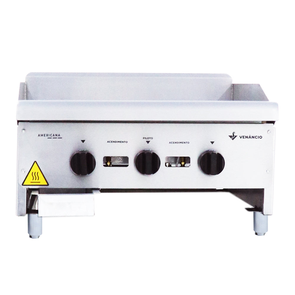  Painel frontal da chapa bifeteira a gás Venâncio CG60 inox, mostrando botões de controle para regulagem de temperatura e queimadores