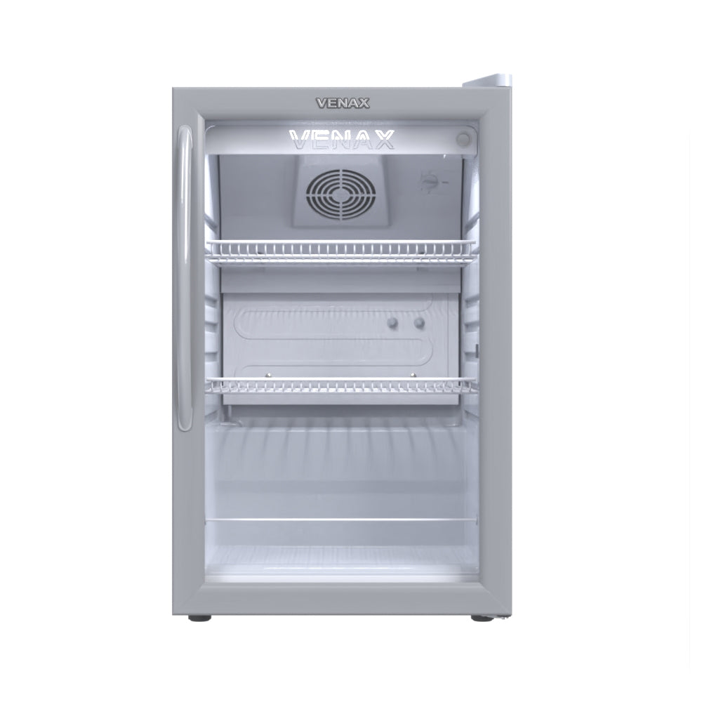 Mini geladeira com porta de vidro Venax VV100, destacando a ventilação interna e o gabinete branco com moldura cinza.
