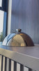 Vídeo de anúncio do cloche profissional service da Tramontina, em aço inox de alto brilho e com 24,5cm de diâmetro. Ideal para hotéis, restaurantes e buffets que buscam servir pratos com elegância e manter a temperatura dos alimentos. Compre o cloche Tramontina na Salvador Comercial.